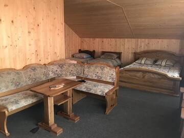 Фото номера Улучшенный четырехместный номер Отель Hotel Novoe Shale г. Яблоница 8